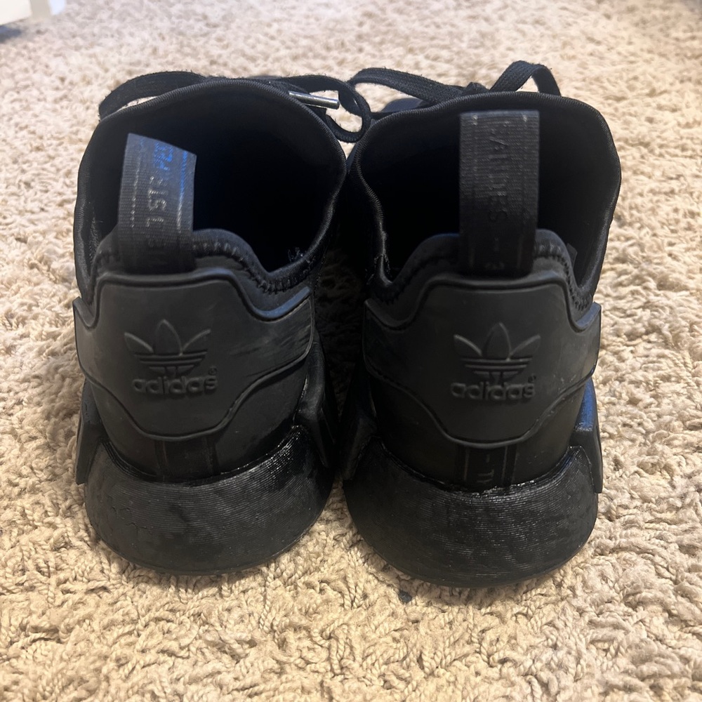 Adidas NMD 1 black. Used but still in good condition. No box.